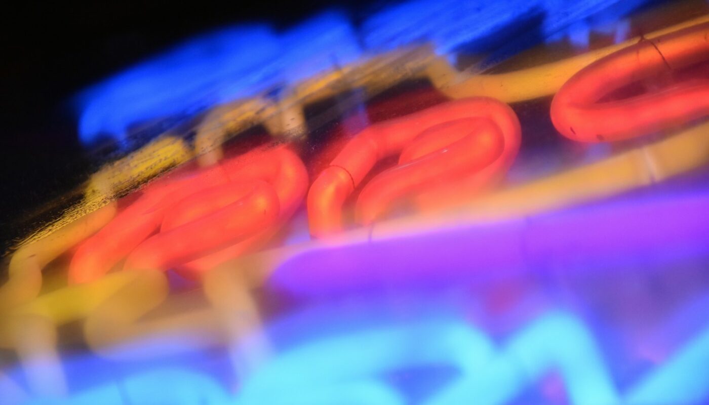 blue and red neon sign